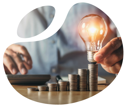 Light Bulb On Coins Photo