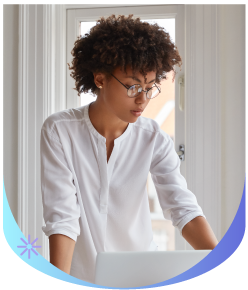 Woman Looking At A Laptop Photo