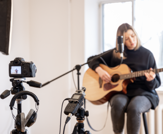 Woman Playing Guitar Photo