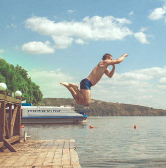 Man Jumping Into The Sea