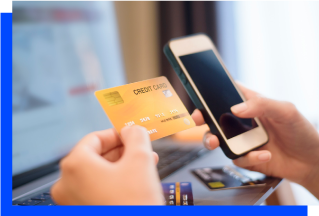 Person Holding Phone And Credit Card Photo