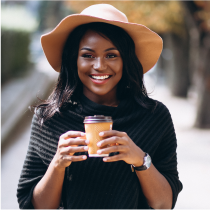 Woman With Hat Holding a Coffee