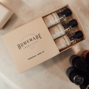 Box of homemade essential oils.
