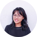 Image of an asian woman with long hair and glasses
