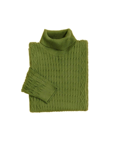 a green sweater folded 