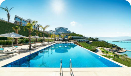 a pool with a building in the background