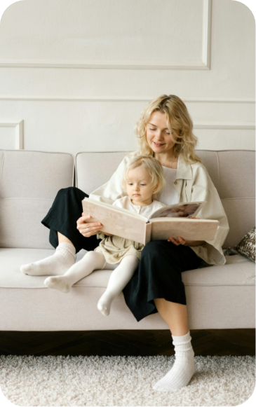 a mother and a child reading a book