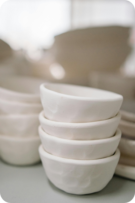 a stack of white bowls