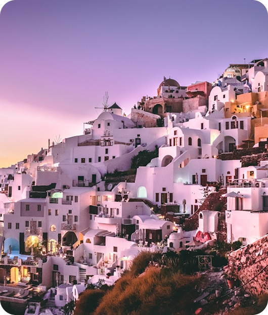 a white buildings on a hill