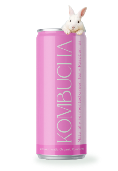 a white rabbit on top of a pink can