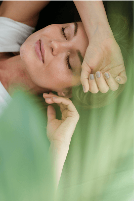 a woman sleeping with her eyes closed