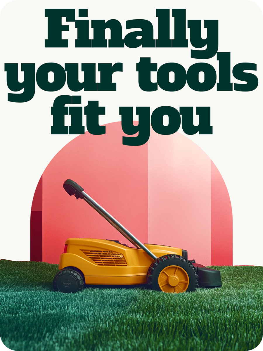 a yellow lawnmower on grass