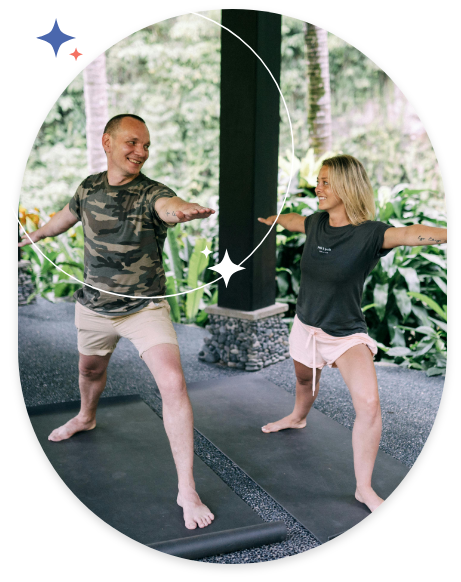 a man and woman doing yoga