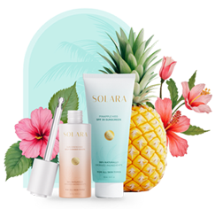 a group of personal care bottles and a pineapple with flowers