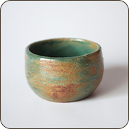 a green and brown bowl