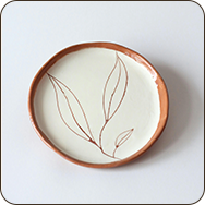 a plate with a leaf design