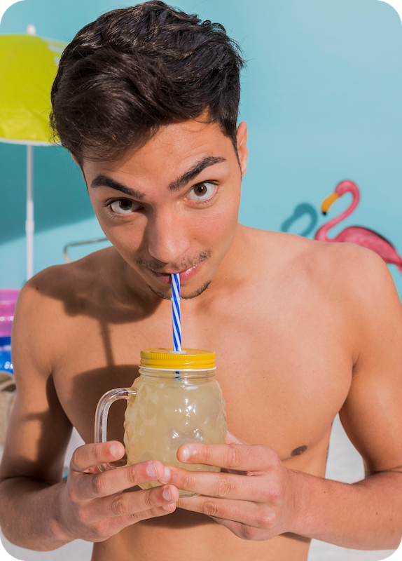 a man drinking from a straw