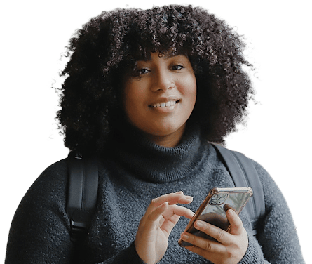 a woman with curly hair holding a cell phone