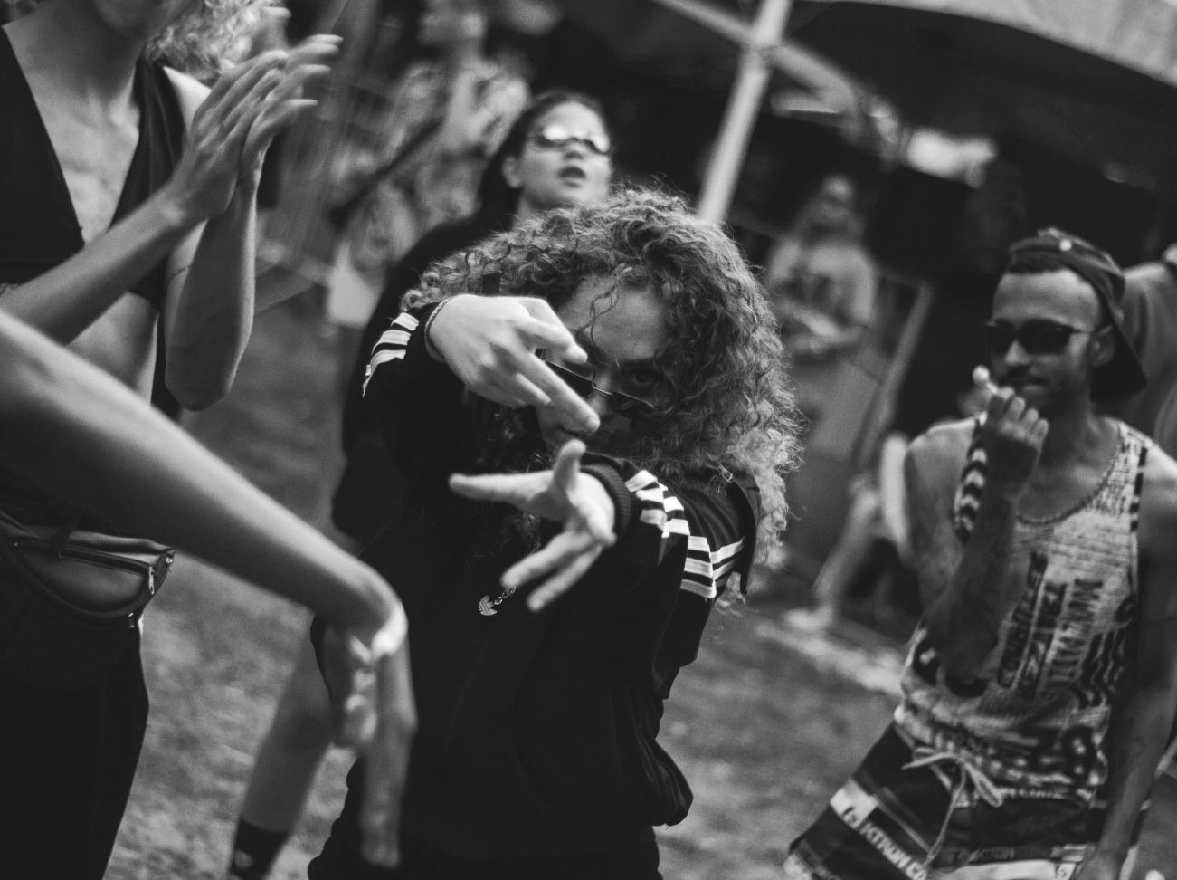 a woman dancing with her hands